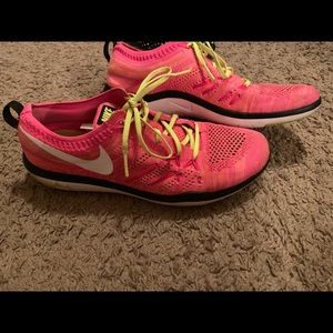 Hot pink nike training shoe